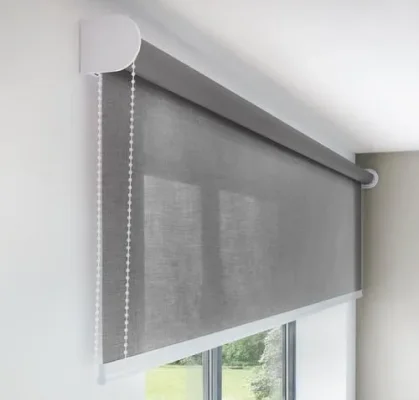 Interior window with grey roller blind