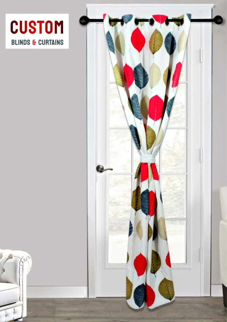 A white door adorned with a vibrant curtain featuring a red, blue, and yellow pattern, adding color to the entrance.